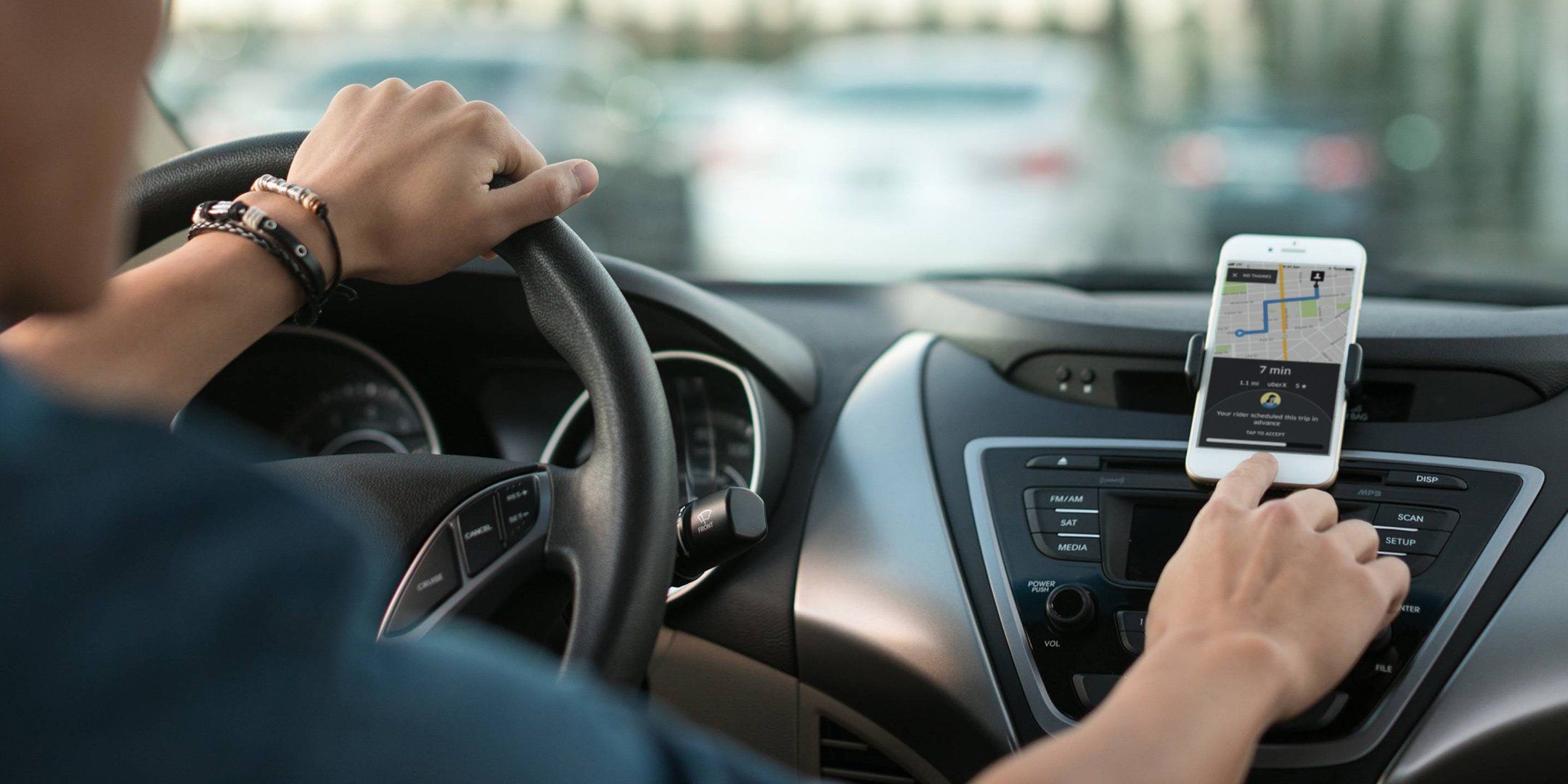 Primary Source: Photograph
Apps like Uber have created new opportunities for workers who want to participate in the gig economy.